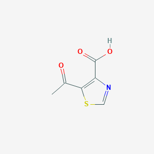 molecular formula C6H5NO3S B1381960 5-Acetyl-1,3-thiazole-4-carboxylic acid CAS No. 1367772-06-2