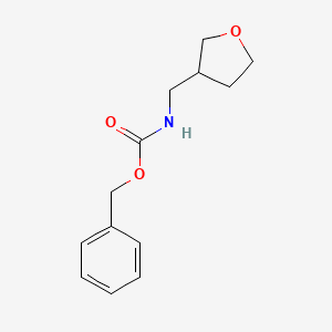 molecular formula C13H17NO3 B1382086 Benzyl N-[(oxolan-3-yl)methyl]carbamate CAS No. 1375745-81-5