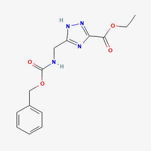molecular formula C14H16N4O4 B1382179 3-({[(苯甲氧基)羰基]氨基}甲基)-1H-1,2,4-三唑-5-羧酸乙酯 CAS No. 1803566-93-9