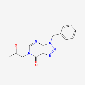 molecular formula C14H13N5O2 B13822996 3-benzyl-6-(2-oxopropyl)-3,6-dihydro-7H-[1,2,3]triazolo[4,5-d]pyrimidin-7-one 