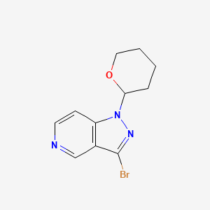 molecular formula C11H12BrN3O B1382594 3-Bromo-1-(tetrahydro-2H-pyran-2-yl)-1H-pyrazolo[4,3-c]pyridine CAS No. 1416712-59-8