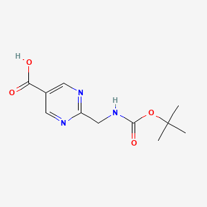 molecular formula C11H15N3O4 B1382631 2-({[(Tert-butoxy)carbonyl]amino}methyl)pyrimidine-5-carboxylic acid CAS No. 1240594-58-4