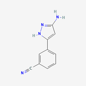 molecular formula C10H8N4 B1382674 3-(5-氨基-1H-吡唑-3-基)苯甲腈 CAS No. 1800082-10-3