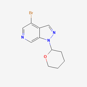 molecular formula C11H12BrN3O B1382678 4-Bromo-1-(tetrahydro-2H-pyran-2-yl)-1H-pyrazolo[3,4-c]pyridine CAS No. 1416713-14-8