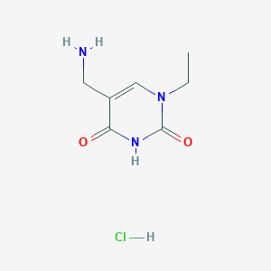 molecular formula C7H12ClN3O2 B1382697 5-(氨甲基)-1-乙基嘧啶-2,4(1H,3H)-二酮盐酸盐 CAS No. 2034156-98-2
