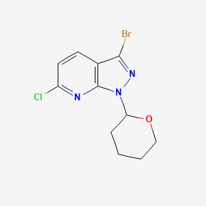 molecular formula C11H11BrClN3O B1383076 3-溴-6-氯-1-(四氢-2H-吡喃-2-基)-1H-吡唑并[3,4-b]吡啶 CAS No. 1416713-12-6