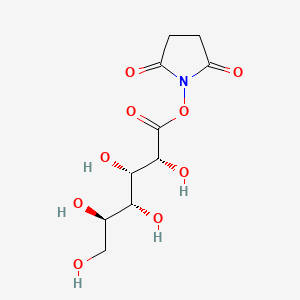 (2,5-dioxopyrrolidin-1-yl) (2R,3S,4R,5R)-2,3,4,5,6-pentahydroxyhexanoate