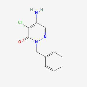 molecular formula C11H10ClN3O B1383203 5-氨基-2-苄基-4-氯-2,3-二氢吡啶并-3-酮 CAS No. 37626-99-6
