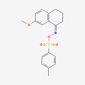 molecular formula C18H19NO4S B13832232 3,4-Dihydro-7-methoxy-2H-1-naphthalenone-O-tosyloxime 