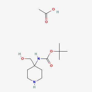 molecular formula C13H26N2O5 B1383379 叔丁基 N-[4-(羟甲基)哌啶-4-基]氨基甲酸酯，乙酸 CAS No. 1803606-54-3