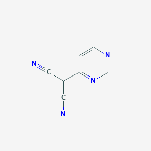 molecular formula C7H4N4 B1383464 2-(嘧啶-4-基)丙二腈 CAS No. 1803582-85-5