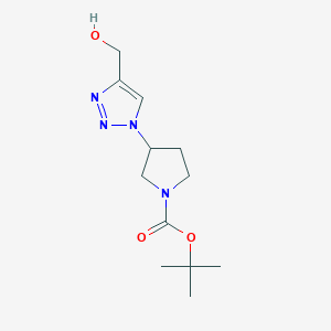 molecular formula C12H20N4O3 B1383657 tert-butyl 3-[4-(hydroxymethyl)-1H-1,2,3-triazol-1-yl]pyrrolidine-1-carboxylate CAS No. 2059993-08-5
