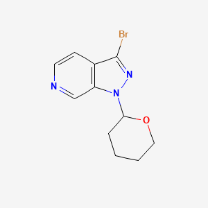 molecular formula C11H12BrN3O B1383659 3-Bromo-1-(tetrahydro-2H-pyran-2-yl)-1H-pyrazolo[3,4-c]pyridine CAS No. 1416713-95-5
