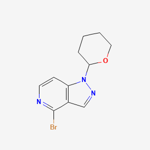 molecular formula C11H12BrN3O B1383664 4-Bromo-1-(tetrahydro-2H-pyran-2-yl)-1H-pyrazolo[4,3-c]pyridine CAS No. 1416712-67-8
