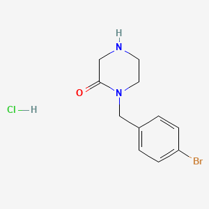 molecular formula C11H14BrClN2O B1383697 1-[(4-Bromophenyl)methyl]piperazin-2-one hydrochloride CAS No. 2060052-87-9
