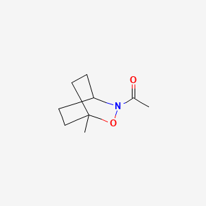 molecular formula C9H15NO2 B13837298 1-(1-Methyl-2-oxa-3-azabicyclo[2.2.2]octan-3-yl)ethanone 