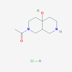 molecular formula C10H19ClN2O2 B1383769 2-Acetyloctahydro-2,7-naphthyridin-4a(2H)-ol hydrochloride CAS No. 2108831-92-9
