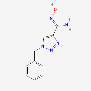 molecular formula C10H11N5O B1384320 1-苄基-N'-羟基-1H-1,2,3-三唑-4-甲酰胺 CAS No. 1255791-11-7