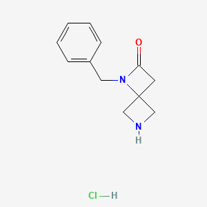 molecular formula C12H15ClN2O B1384329 1-苄基-1,6-二氮杂螺[3.3]庚烷-2-酮盐酸盐 CAS No. 2060041-86-1