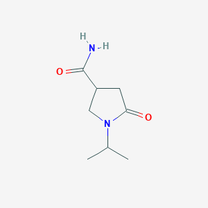 B1386140 1-Isopropyl-2-oxopyrrolidine-4-carboxamide CAS No. 90152-93-5