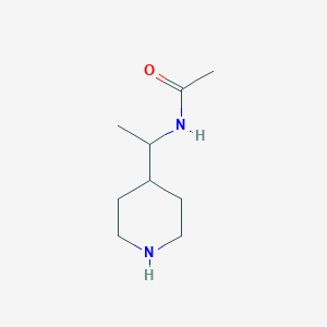 molecular formula C9H18N2O B1386360 N-[1-(piperidin-4-yl)ethyl]acetamide CAS No. 1156253-30-3