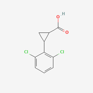 molecular formula C10H8Cl2O2 B1386620 2-(2,6-Dichlorophenyl)cyclopropane-1-carboxylic acid CAS No. 1157698-73-1