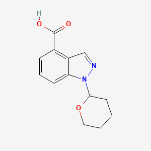 molecular formula C13H14N2O3 B1386663 1-(四氢-2H-吡喃-2-基)-1H-吲唑-4-羧酸 CAS No. 1000576-23-7