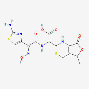 molecular formula C14H15N5O6S2 B13871658 2(R)-2-[(Z)-2-(Aminothiazol-4-yl)-2-(hydroxyimino)acetamido)]-2-[(2RS,5RS)-5-methyl-7-oxo-2,4,5,7-tetrahydro-1H-furo[3,4-d][1,3]thiazin-2-yl]acetic Ac 