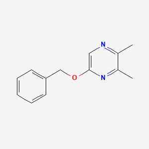 molecular formula C13H14N2O B13873059 2,3-Dimethyl-5-[(phenylmethyl)oxy]pyrazine 