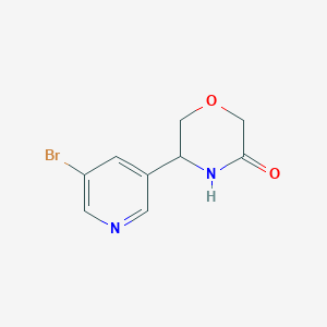 molecular formula C9H9BrN2O2 B13880757 5-(5-Bromopyridin-3-yl)morpholin-3-one 