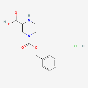 molecular formula C13H17ClN2O4 B1388894 4-((Benzyloxy)carbonyl)piperazine-2-carboxylic acid hydrochloride CAS No. 64172-99-2