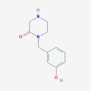 1-[(3-Hydroxyphenyl)methyl]piperazin-2-one