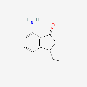 molecular formula C11H13NO B13892552 7-Amino-3-ethyl-indan-1-one 