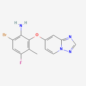 molecular formula C13H10BrFN4O B13897217 6-Bromo-4-fluoro-3-methyl-2-([1,2,4]triazolo[1,5-a]pyridin-7-yloxy)aniline 