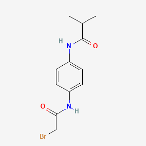 molecular formula C12H15BrN2O2 B1389740 N-{4-[(2-Bromoacetyl)amino]phenyl}-2-methylpropanamide CAS No. 1138442-65-5