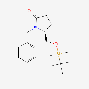 (S)-1-Benzyl-5-(((tert-butyldimethylsilyl)oxy)methyl)pyrrolidin-2-one