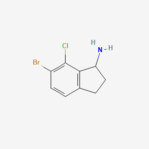 molecular formula C9H9BrClN B13904959 6-bromo-7-chloro-2,3-dihydro-1H-inden-1-amine 