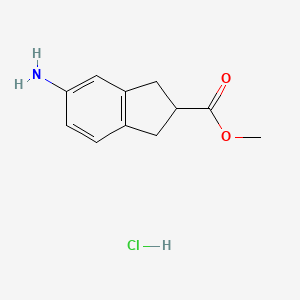 Methyl 5-aminoindane-2-carboxylate;hydrochloride