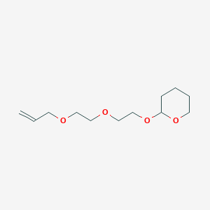 2-(2-{2-[(Prop-2-en-1-yl)oxy]ethoxy}ethoxy)oxane