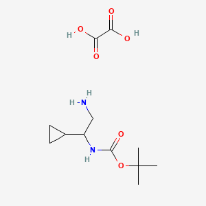 molecular formula C12H22N2O6 B13911909 tert-butyl N-[(1R)-2-amino-1-cyclopropyl-ethyl]carbamate;oxalic acid 