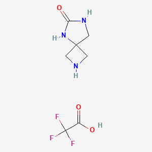 molecular formula C7H10F3N3O3 B13911950 2,5,7-Triazaspiro[3.4]octan-6-one;2,2,2-trifluoroacetic acid 