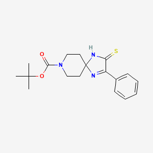 molecular formula C18H23N3O2S B1391202 叔丁基 2-苯基-3-硫代-1,4,8-三氮杂螺[4.5]癸-1-烯-8-羧酸酯 CAS No. 892289-95-1