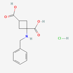 (1s,3s)-1-(Benzylamino)cyclobutane-1,3-dicarboxylic acid hydrochloride