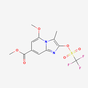 molecular formula C12H11F3N2O6S B13913154 Methyl 5-methoxy-3-methyl-2-(((trifluoromethyl)sulfonyl)oxy)imidazo[1,2-a]pyridine-7-carboxylate 