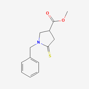 B1391606 Methyl 1-Benzyl-5-thioxopyrrolidine-3-carboxylate CAS No. 874130-13-9