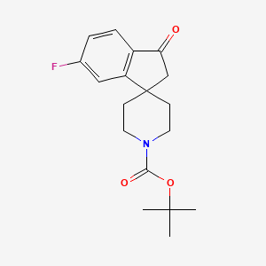 molecular formula C18H22FNO3 B1391862 叔丁基-6-氟-3-氧代-2,3-二氢螺[茚满-1,4'-哌啶]-1'-羧酸酯 CAS No. 910442-55-6