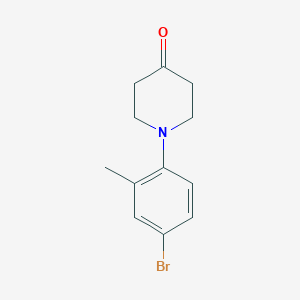 molecular formula C12H14BrNO B13925223 1-(4-Bromo-2-methylphenyl)piperidin-4-one 