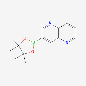 molecular formula C14H17BN2O2 B1392779 3-(4,4,5,5-四甲基-1,3,2-二氧杂硼环-2-基)-1,5-萘啶 CAS No. 1356165-79-1