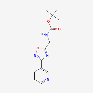 molecular formula C13H16N4O3 B1393015 叔丁基 N-{[3-(吡啶-3-基)-1,2,4-恶二唑-5-基]甲基}氨基甲酸酯 CAS No. 1053656-62-4