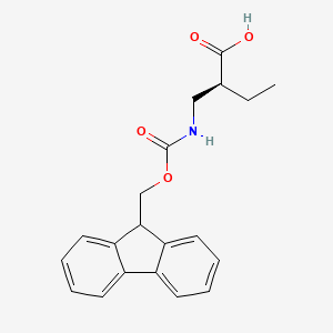 B1394929 (S)-2-[(9H-Fluoren-9-ylmethoxycarbonylamino)-methyl]-butyric acid CAS No. 1217785-38-0